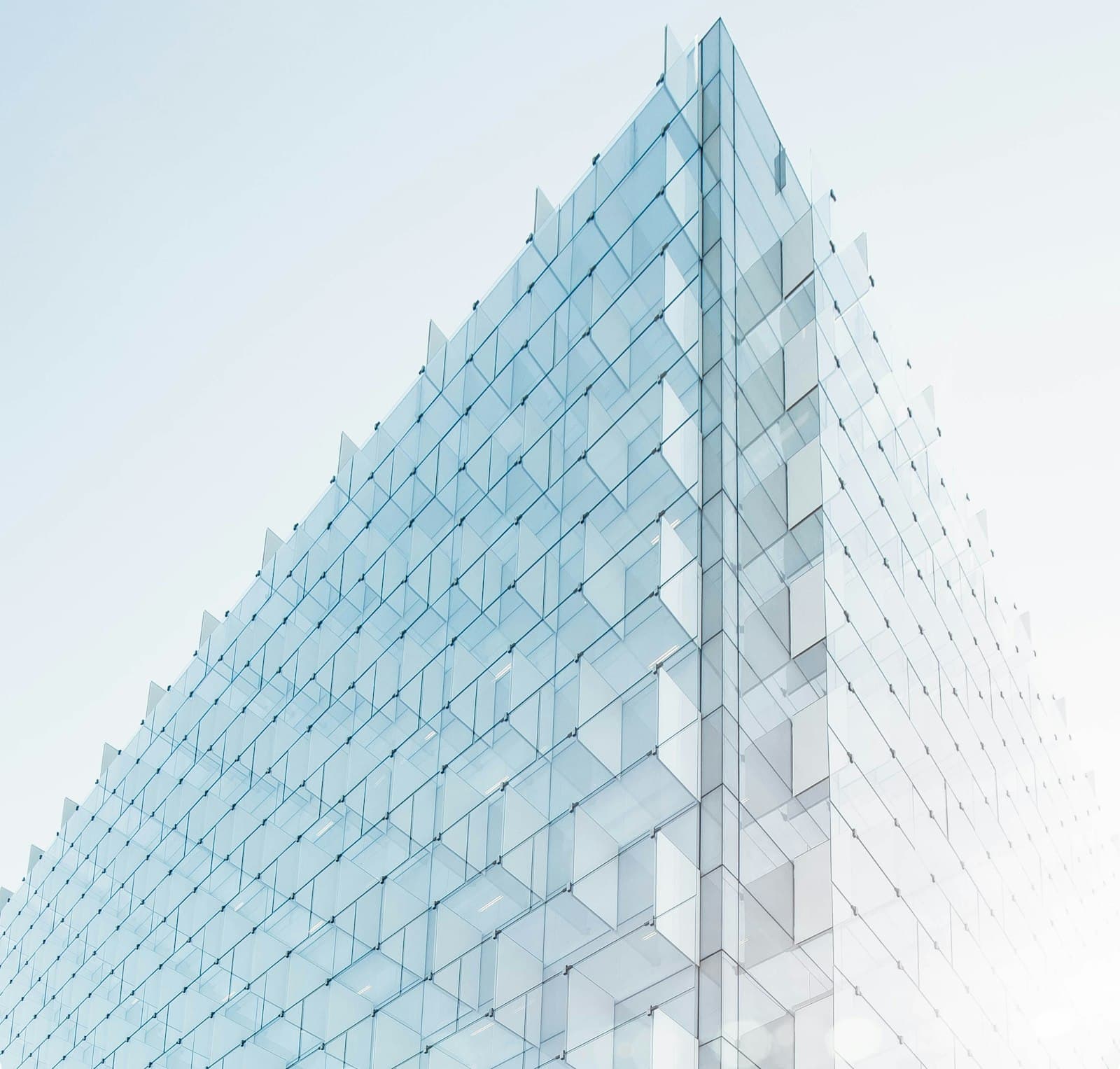 Modern glass architecture representing connected, scalable systems